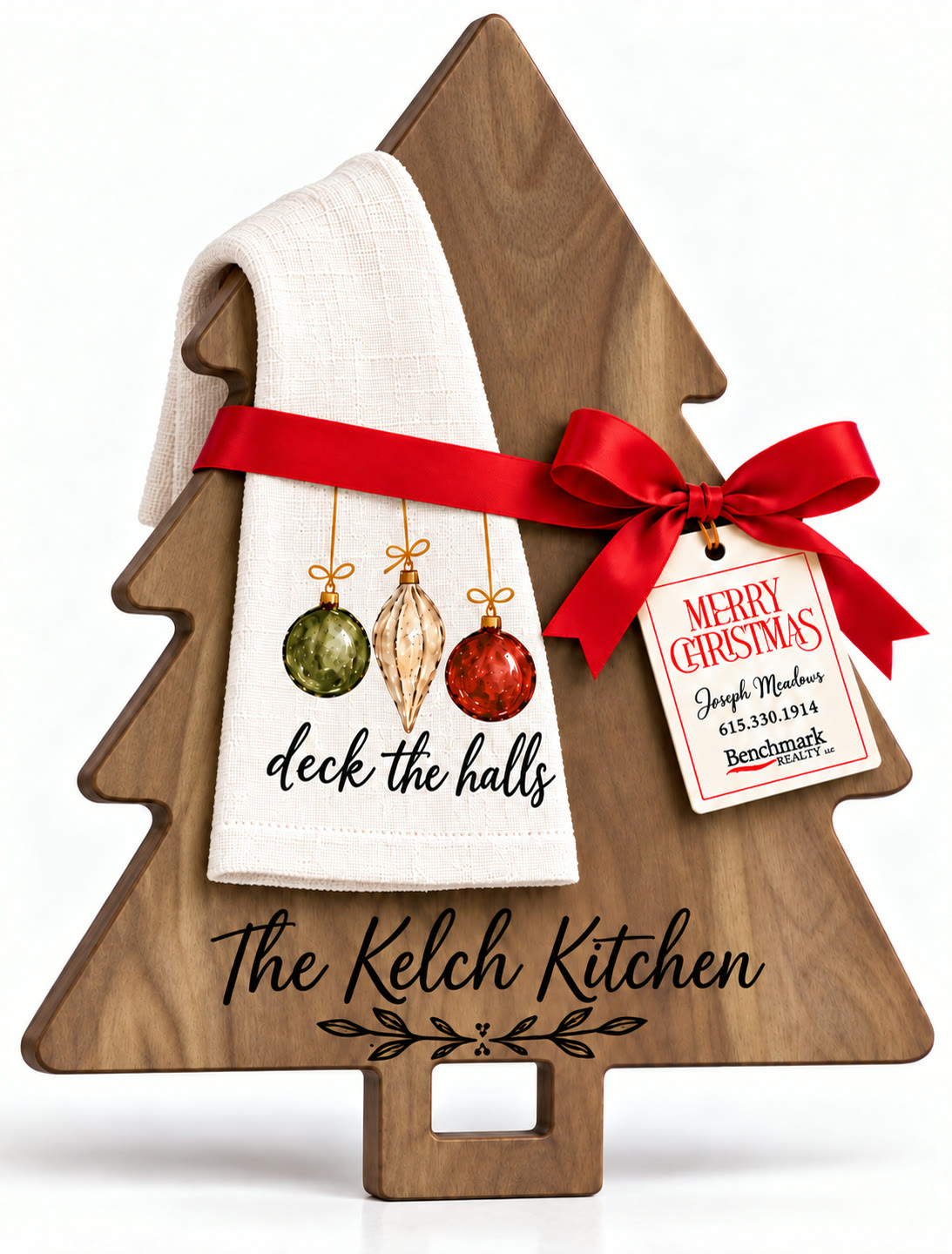 Tree-shaped engraved board with a kitchen towel in the Deck the Halls design