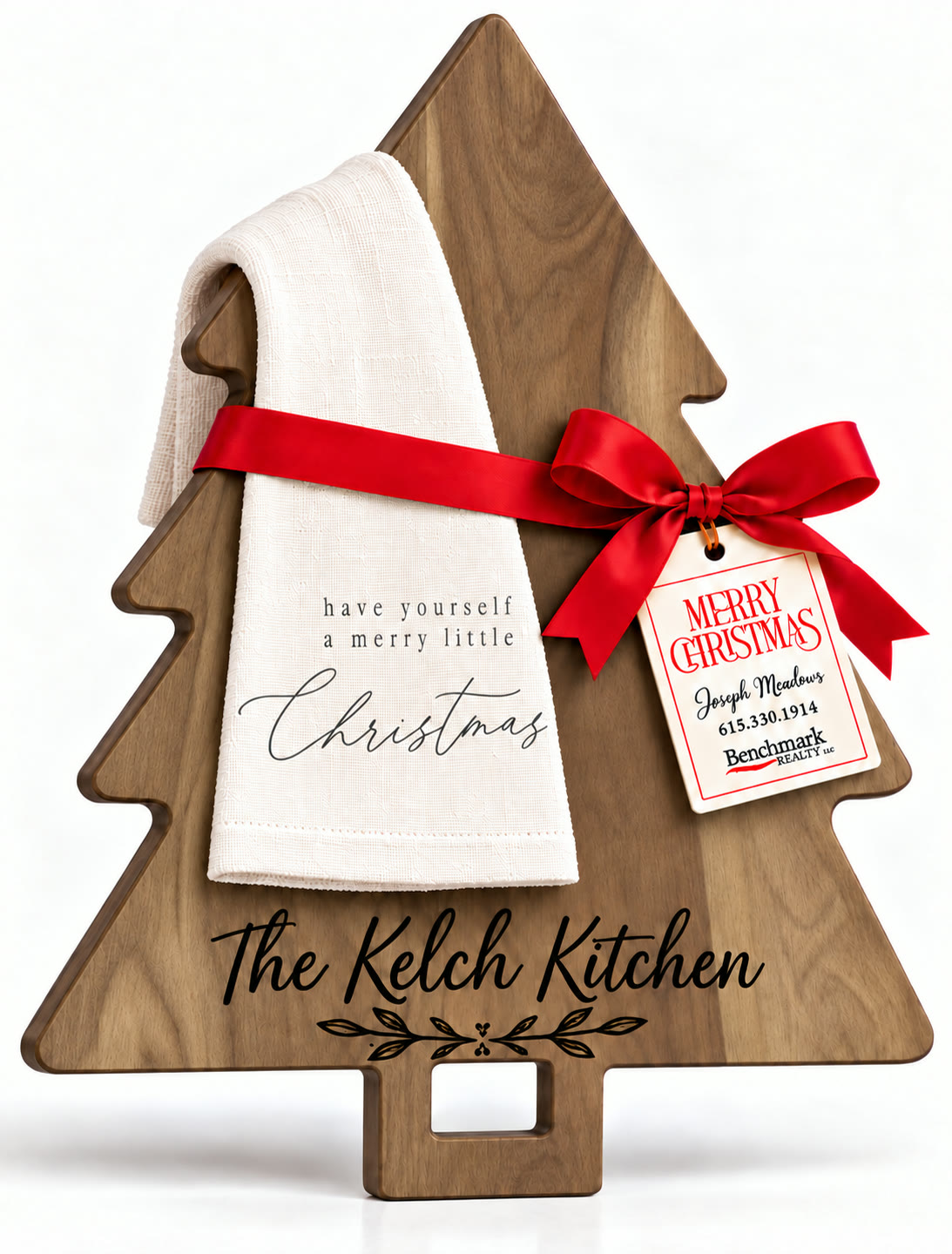 Tree-shaped engraved board with a kitchen towel in the Have Yourself a Merry Little Christmas design