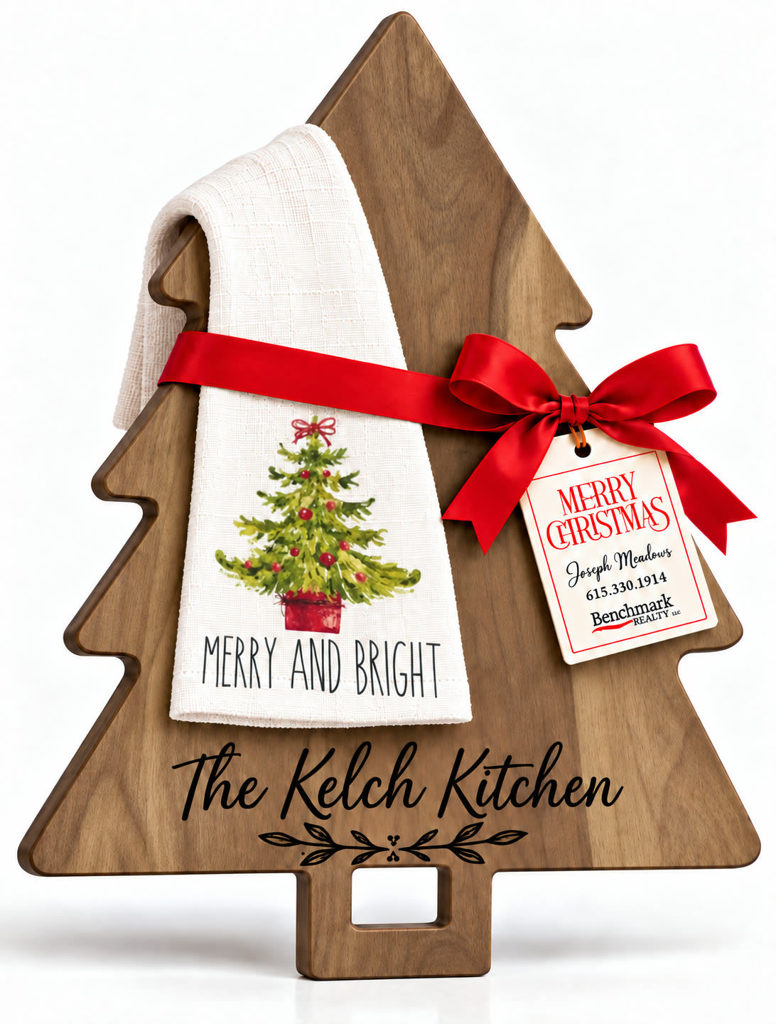Tree-shaped engraved board with a kitchen towel in the Merry & Bright design