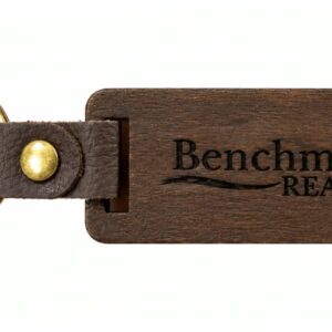 Wooden keychain personalized with a Benchmark Realty logo
